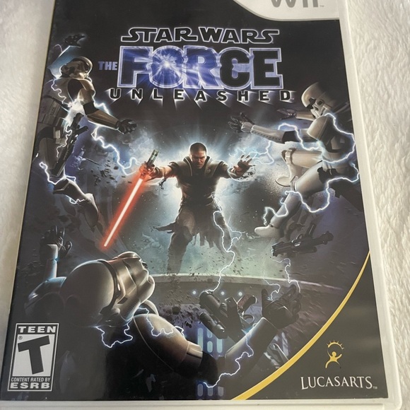 Lucasarts Star Wars The Force Unleashed Wii.      T teen with book - Picture 2 of 5
